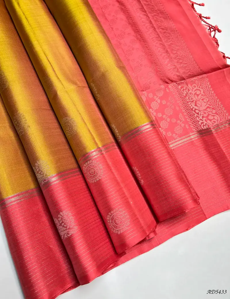 Coral pink and antique gold fabric colour pairing